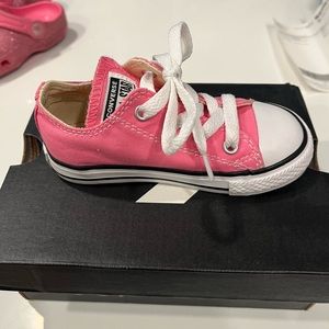Size 7c pink and white converse.